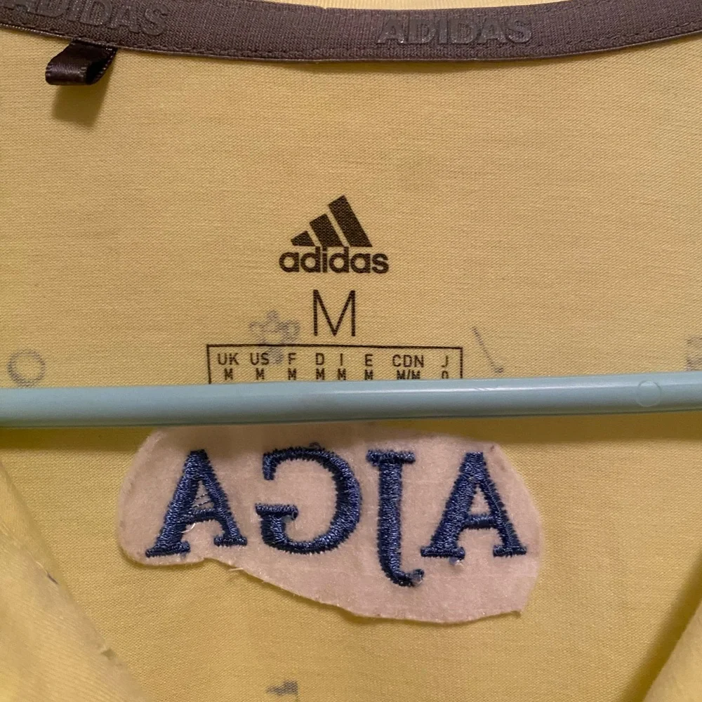 Adidas golf polo.‎ Size medium